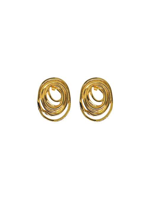 Pair of gold spiral earrings on a white background