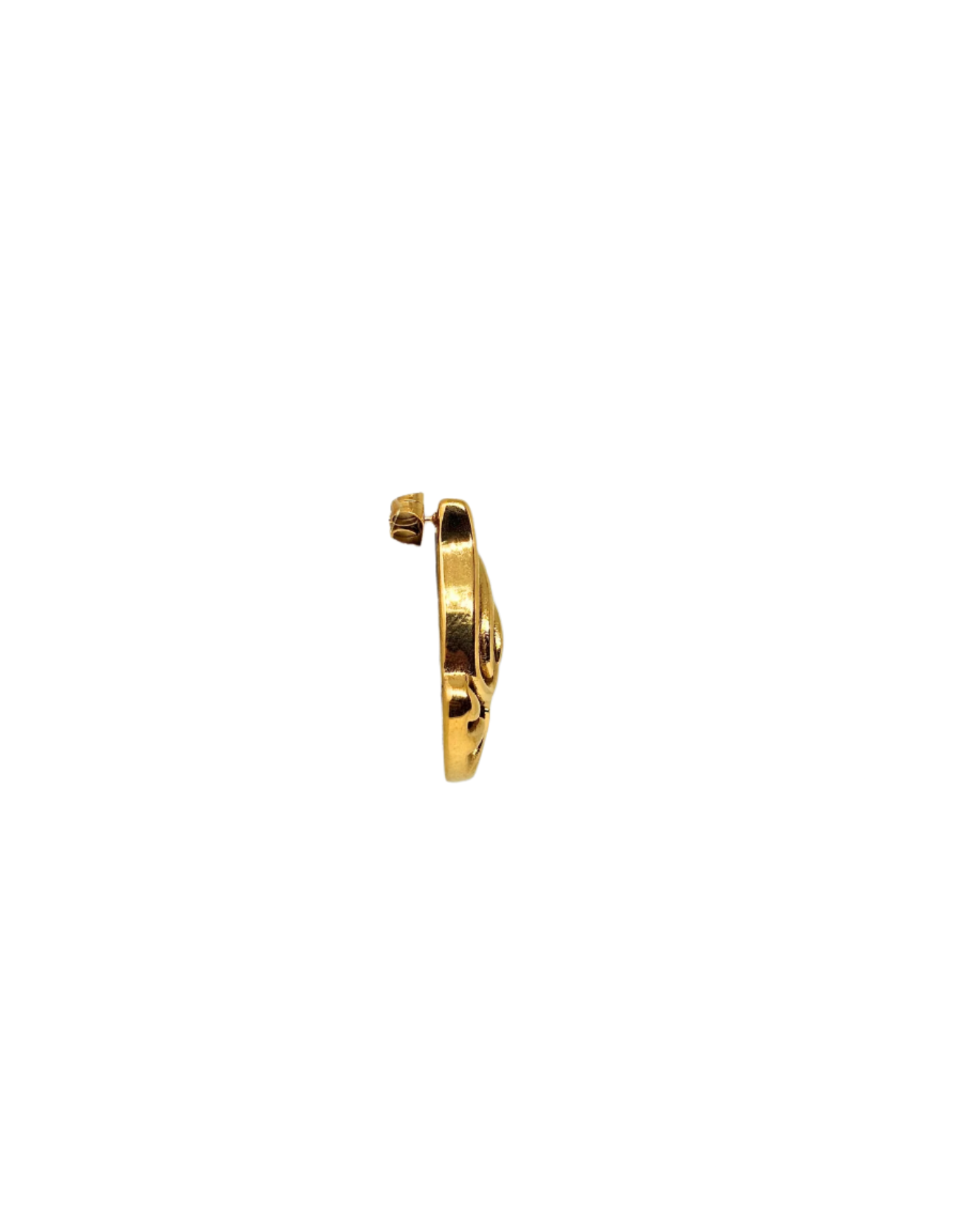 Gold earring on a white background
