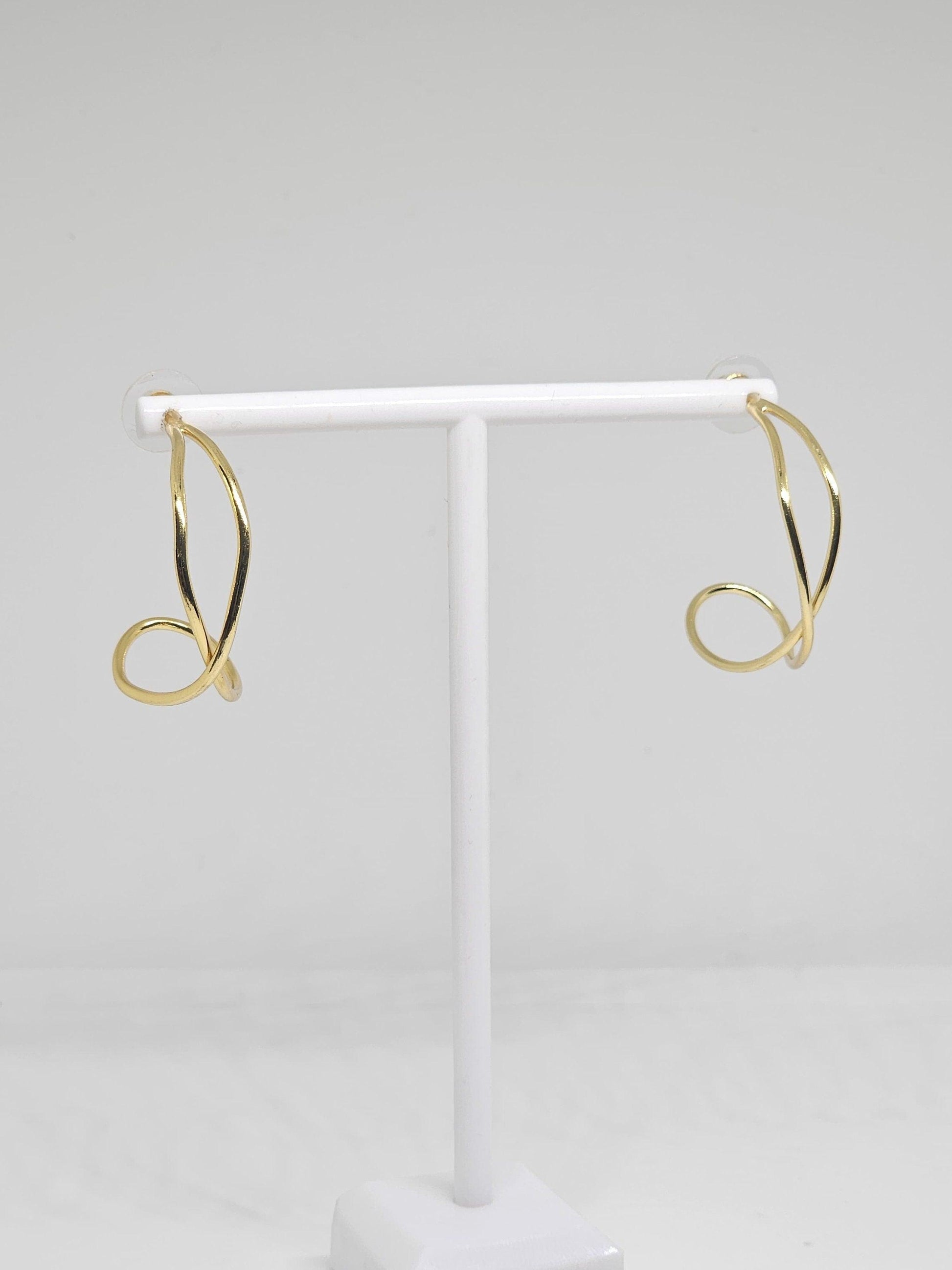 Modern and Trendy Gold Wave Hoop Earrings as a stylish gift for her