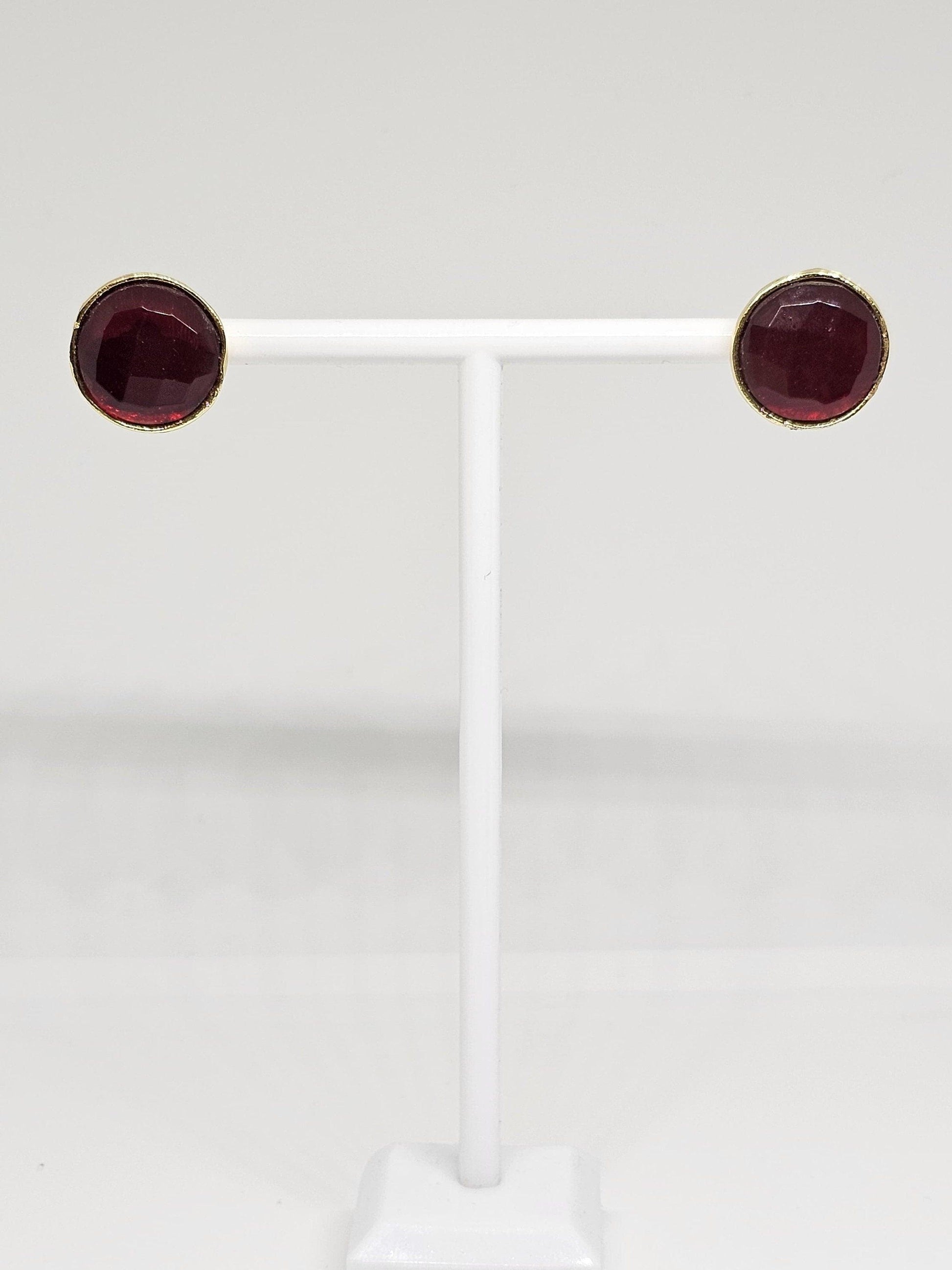 Elegant brass and red gemstone stud earrings, designed for a timeless and chic style, suitable for both casual and formal wear