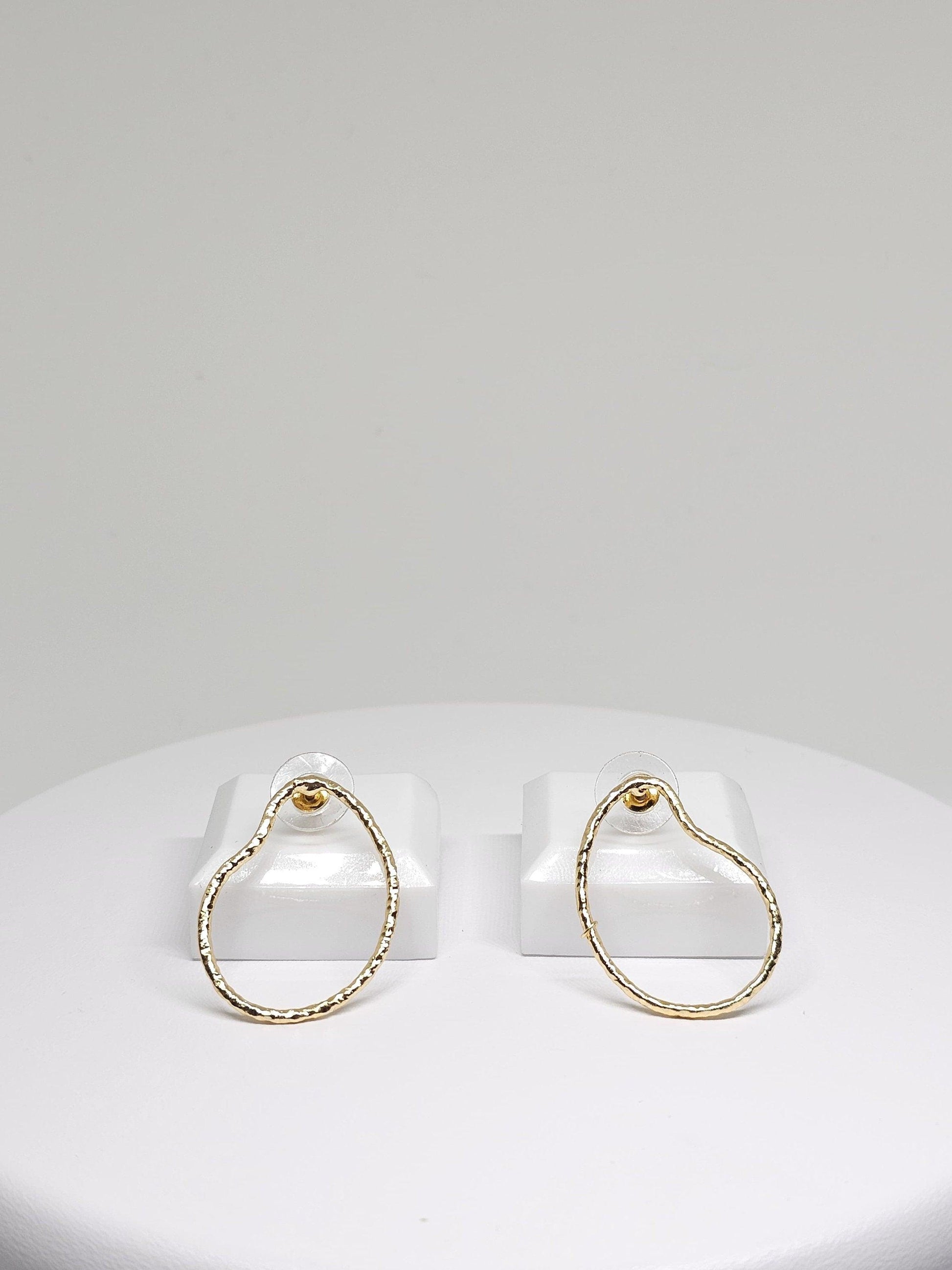 Featuring a sophisticated pear-shaped silhouette, the Simple Brass Pear Hoop Earrings are expertly fashioned from high-quality brass, boasting a durable construction with a radiant, gold-inspired finish