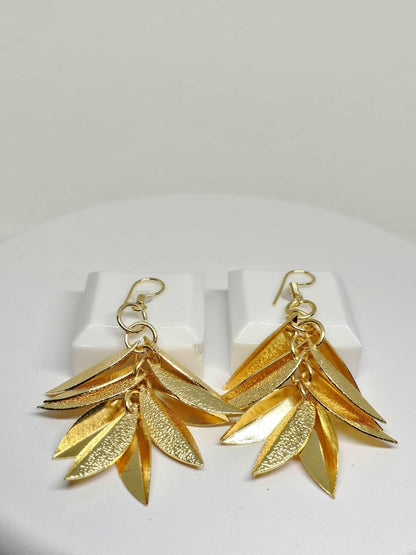 Chic gold-plated dangle earrings featuring cascading leaves