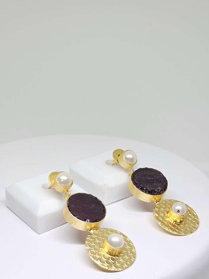 Sophisticated gold drop earrings with a combination of purple stone and pearl accents, perfect for any occasion