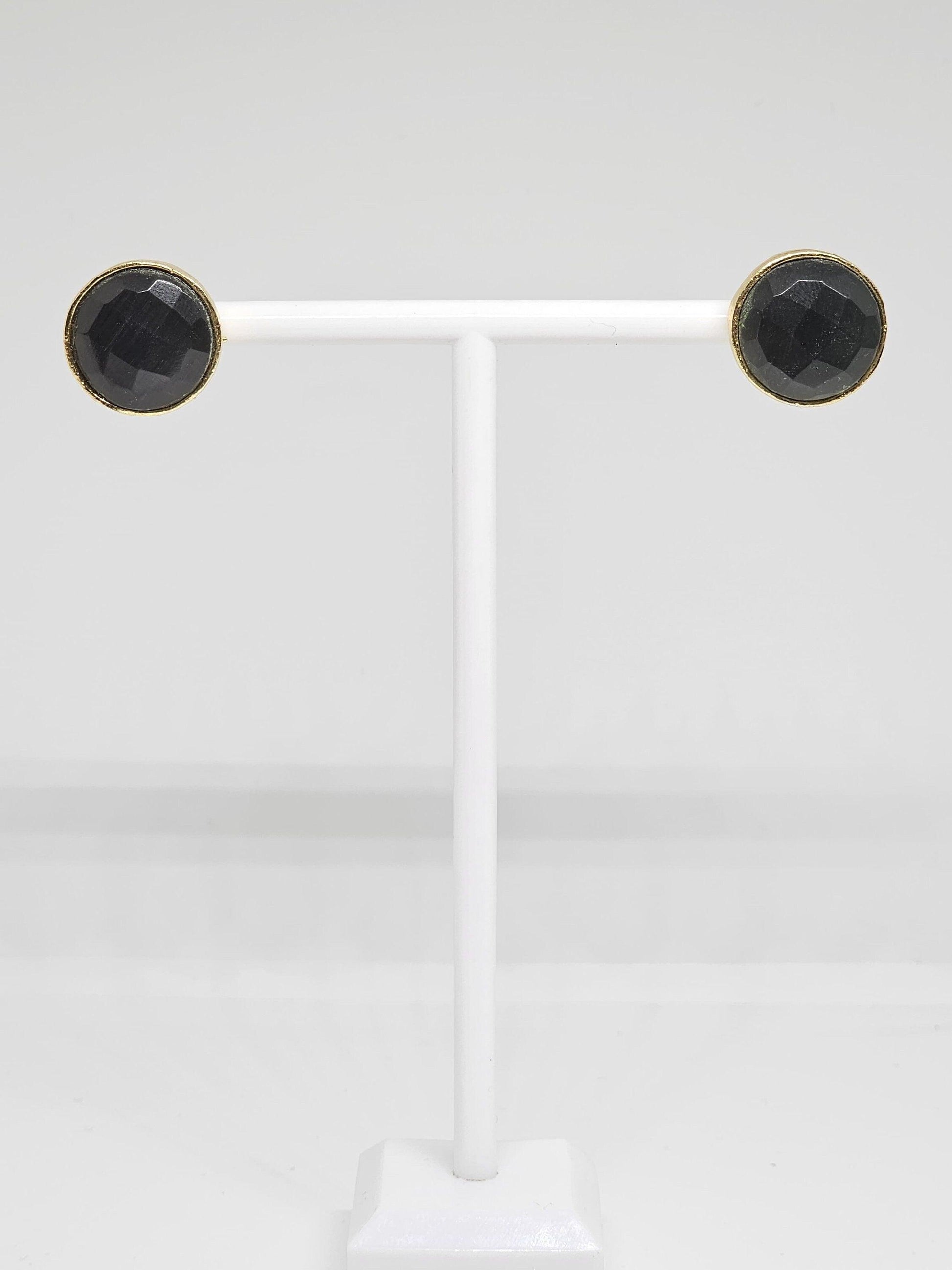 Stylish and versatile black stone brass stud earrings, combining modern design with timeless elegance for a chic look.