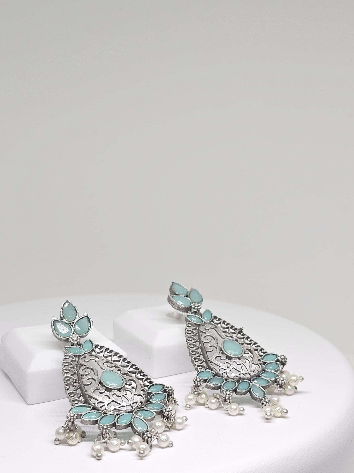 Silver drop earrings with turquoise and pearl accents, traditional meets modern style