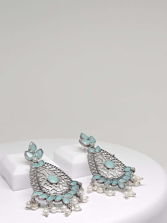 Silver drop earrings with turquoise and pearl accents, traditional meets modern style
