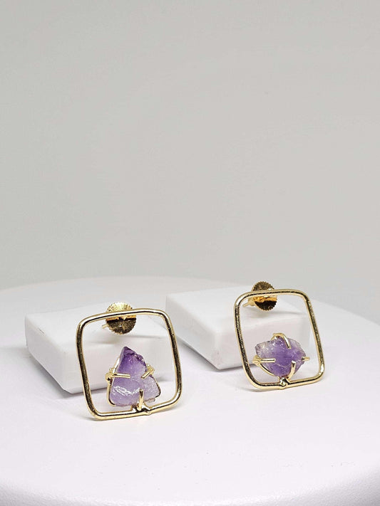 Boho brass earrings featuring raw amethyst stones in a geometric square design, perfect for a unique and stylish accessory.