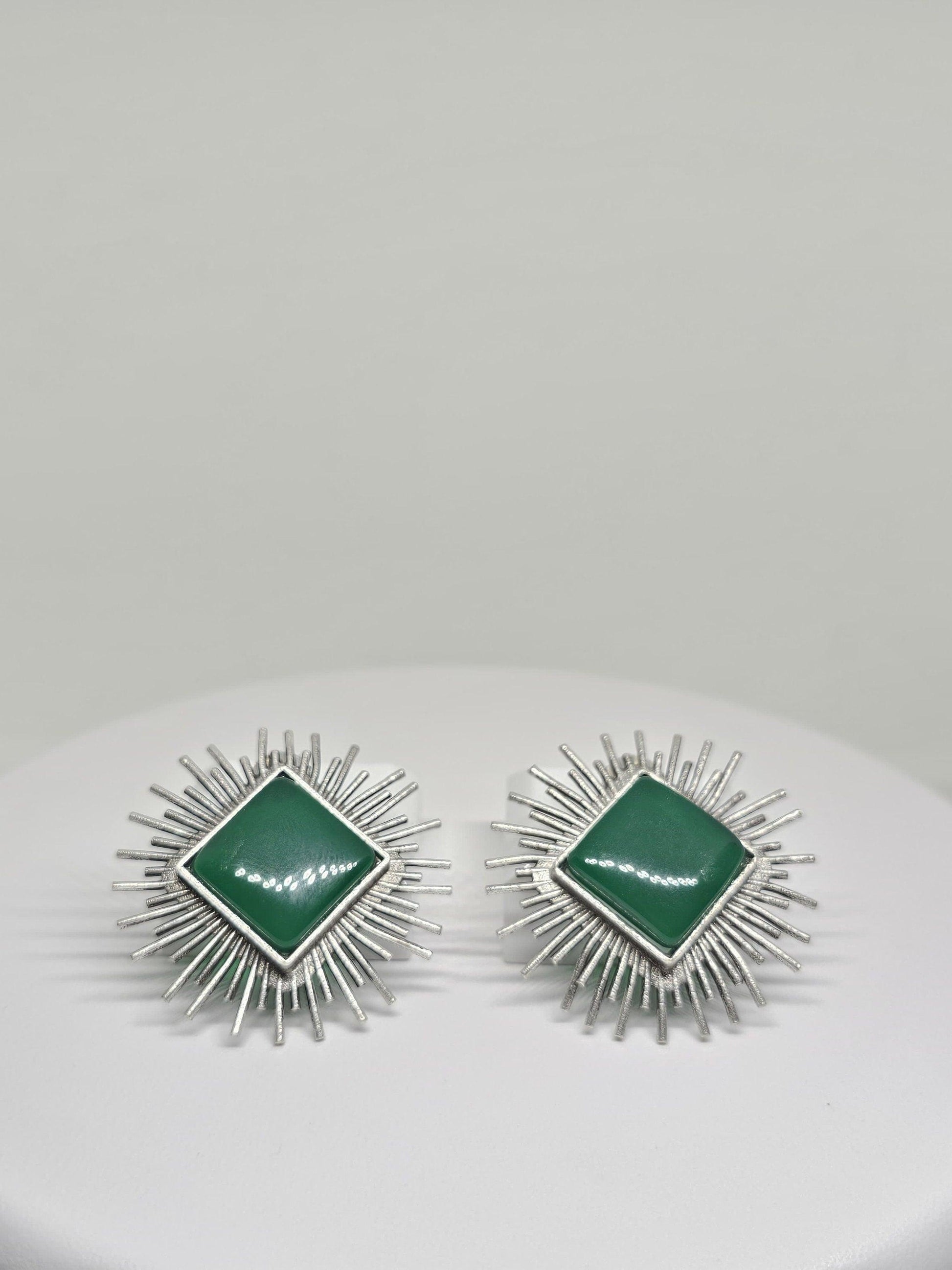 Handmade boho chic earrings with green stones and silver sunburst design