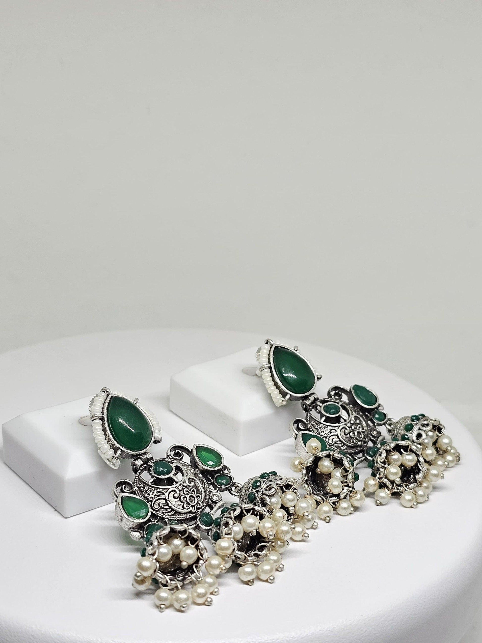 Handcrafted green stone and silver jhumka earrings with pearl accents, boho ethnic jewelry