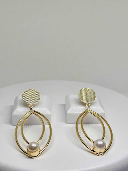 Elegant gold earrings featuring two teardrop-shaped frames and a pearl accent, perfect for adding a touch of sophistication to any outfit