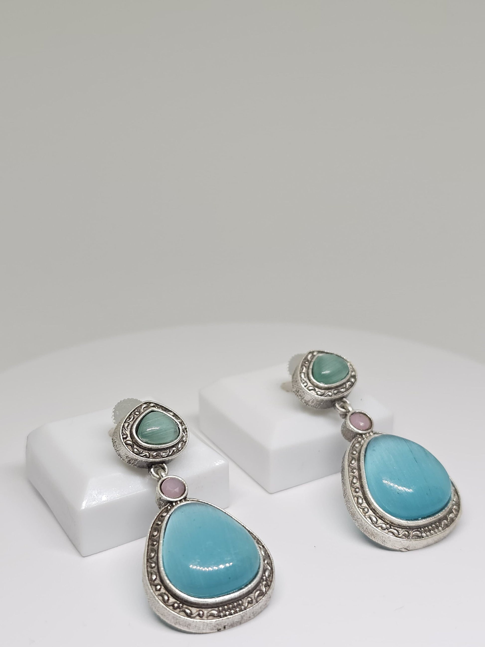 Boho chic oxidized silver earrings with layered aqua blue and green stones