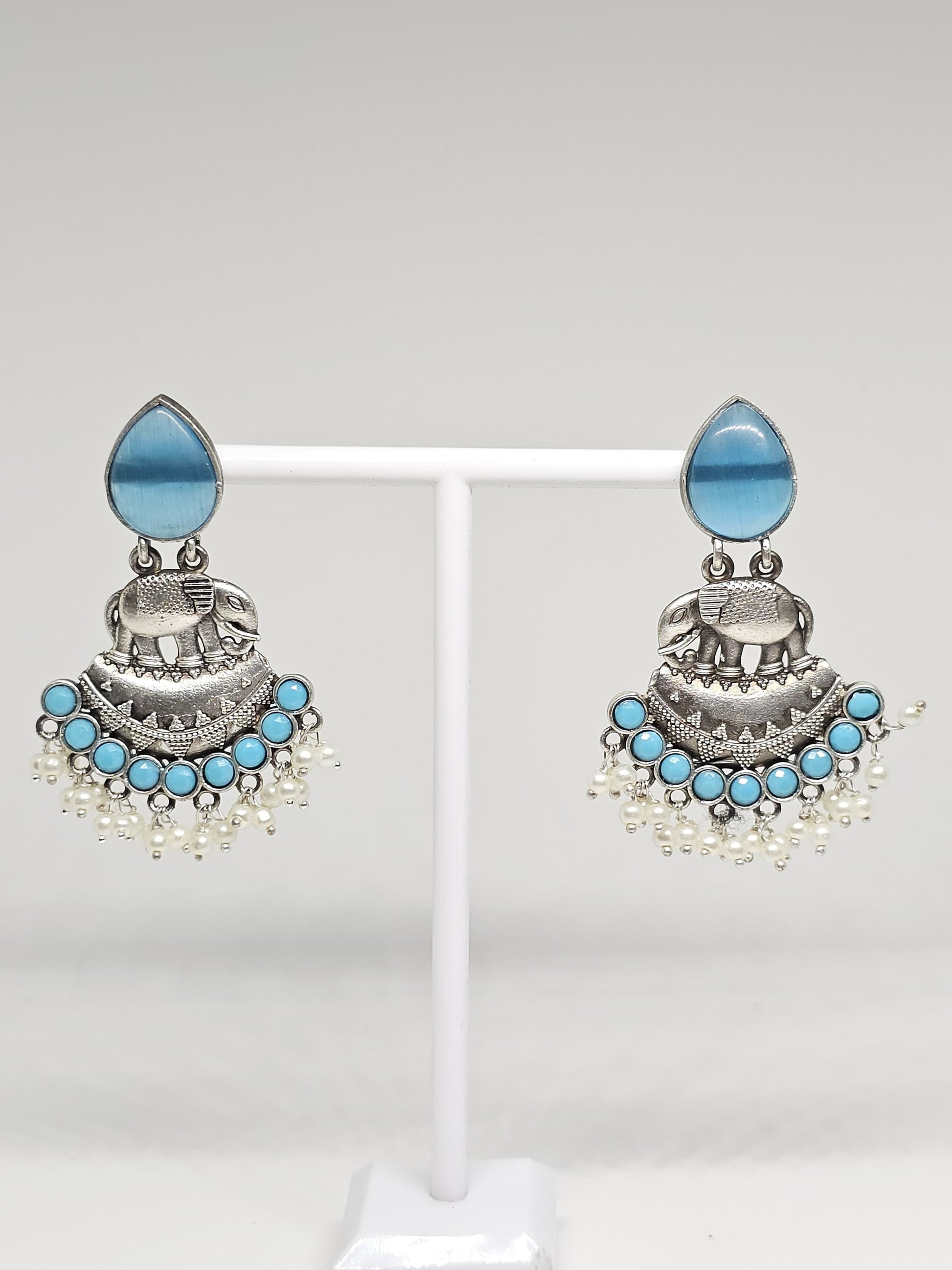 Handcrafted silver earrings with blue stones and elephant motif, pearl accents, boho chic statement jewelry