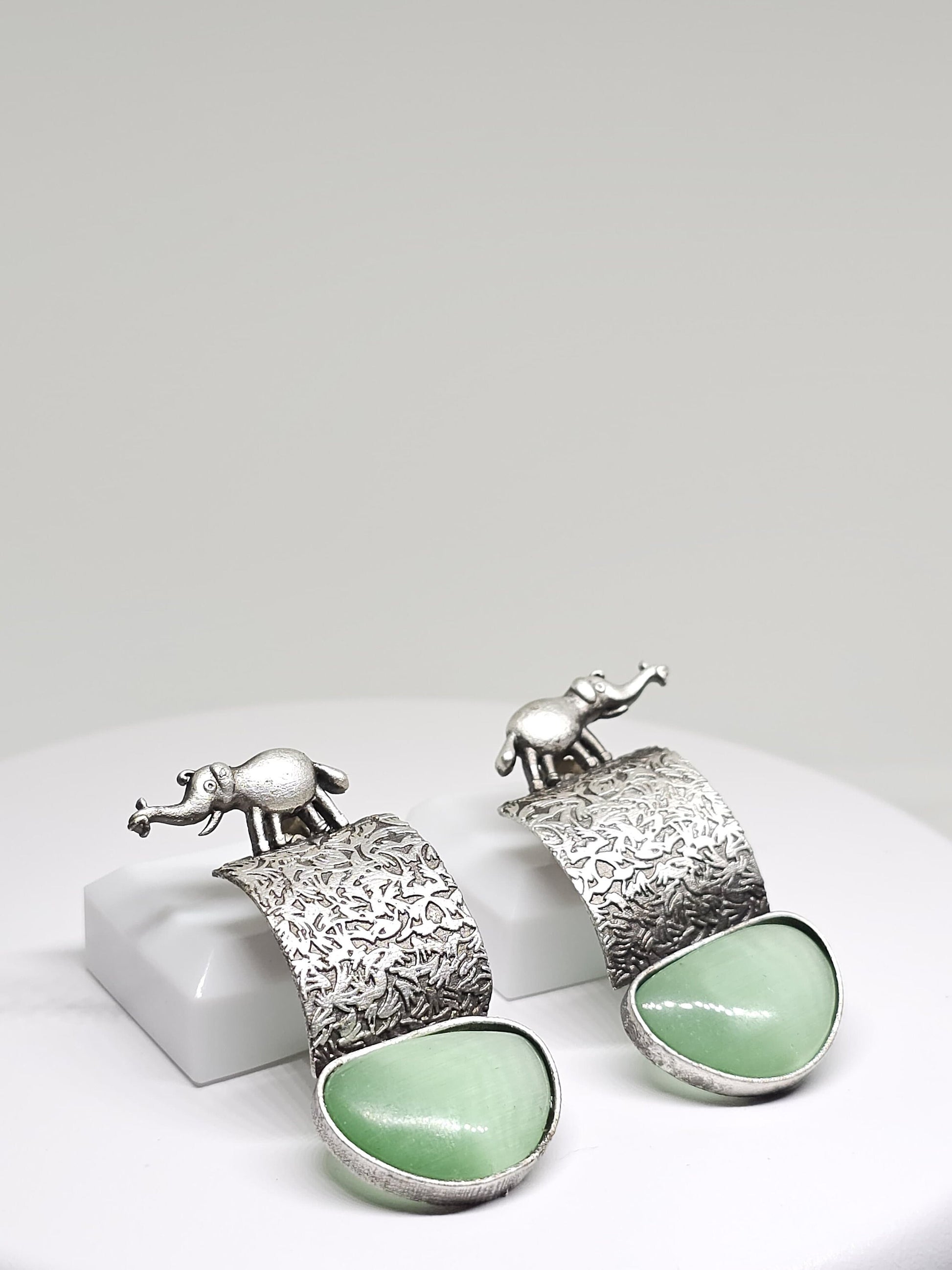 Handcrafted Silver-Plated Elephant Motif Earrings with Tribal Design, Featuring Green or Brown Stone Drops, Lightweight Dangle Jewelry