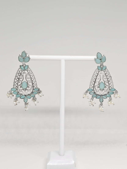 Elegant silver drop earrings with blue turquoise accents and pearl dangles