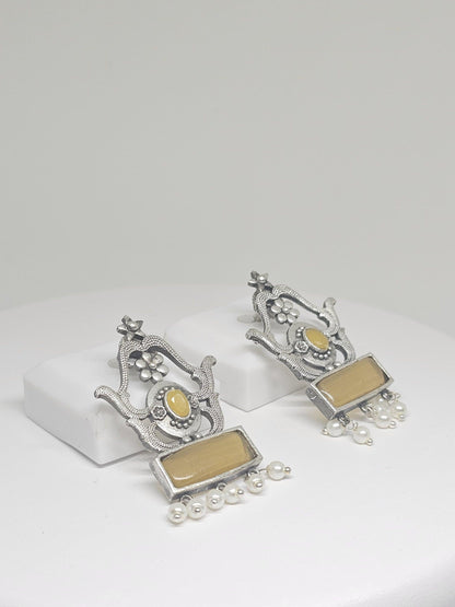 Handmade ethnic Indian dangle earrings with yellow stones and pearl accents, elegant traditional jewelry