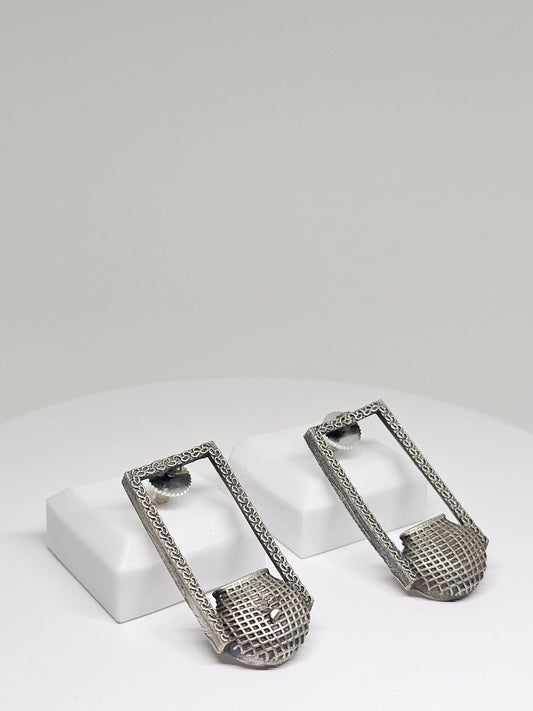 Handcrafted antique silver geometric drop earrings with rectangular frames and textured detailing, vintage boho statement jewelry