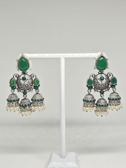 Traditional green and silver jhumka earrings with pearls, ethnic Indian chandbali design