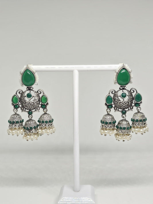 Traditional green and silver jhumka earrings with pearls, ethnic Indian chandbali design