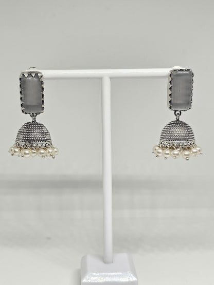 Handcrafted traditional silver jhumka earrings with grey stone and pearl accents