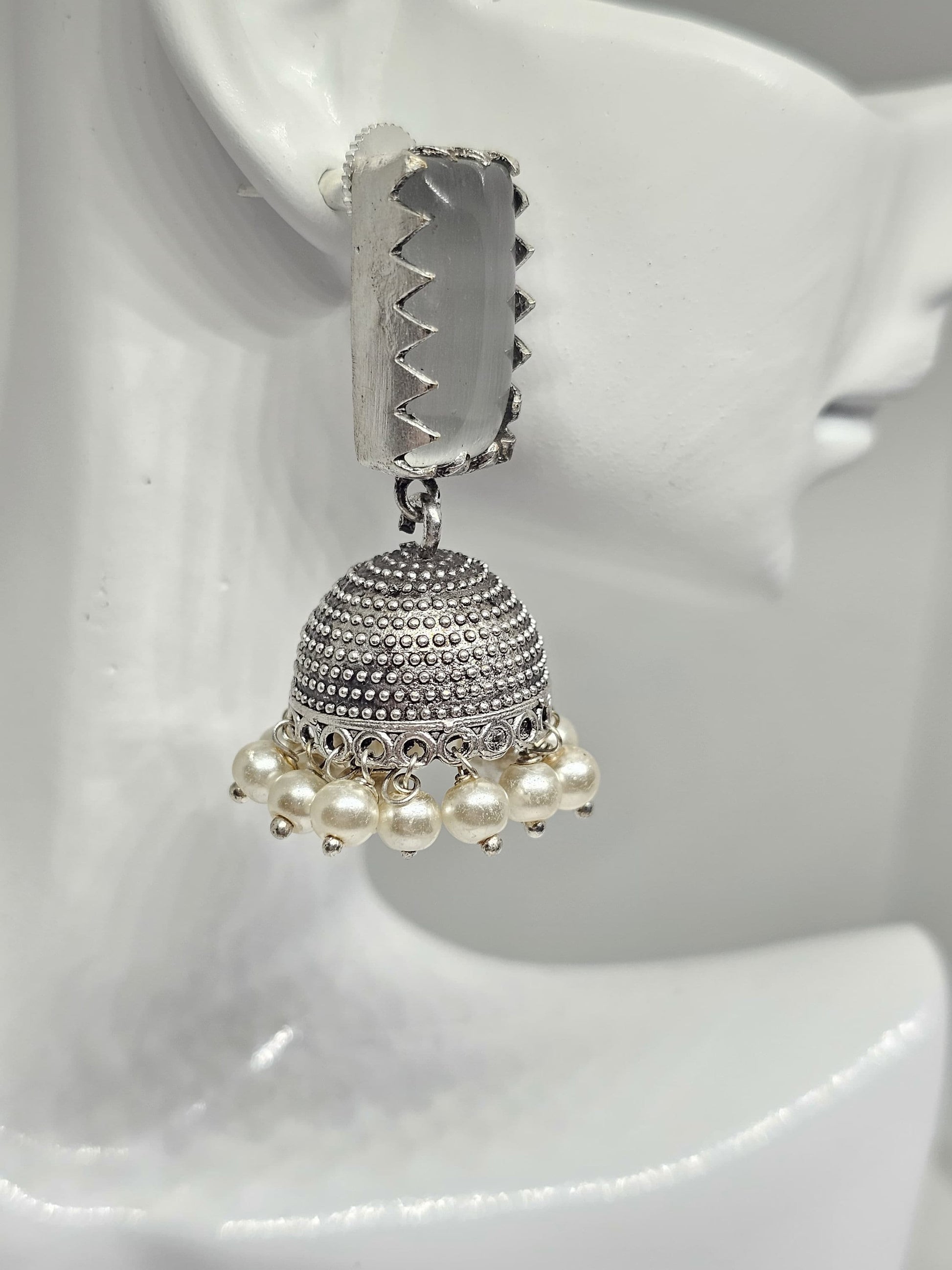 Handcrafted traditional silver jhumka earrings with grey stone and pearl accents