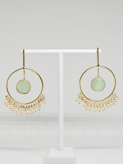 Gold-plated hoop earrings with green stone and pearl dangles on display