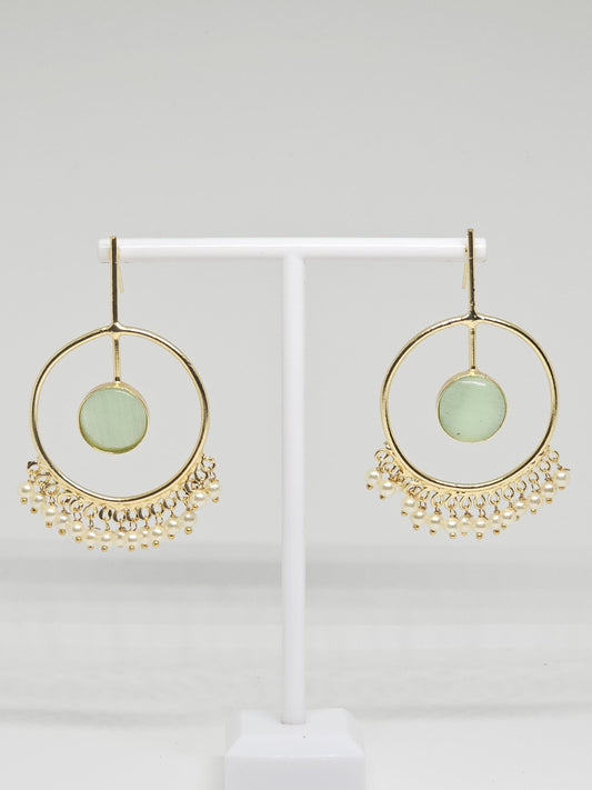 Gold-plated hoop earrings with green stone and pearl dangles on display
