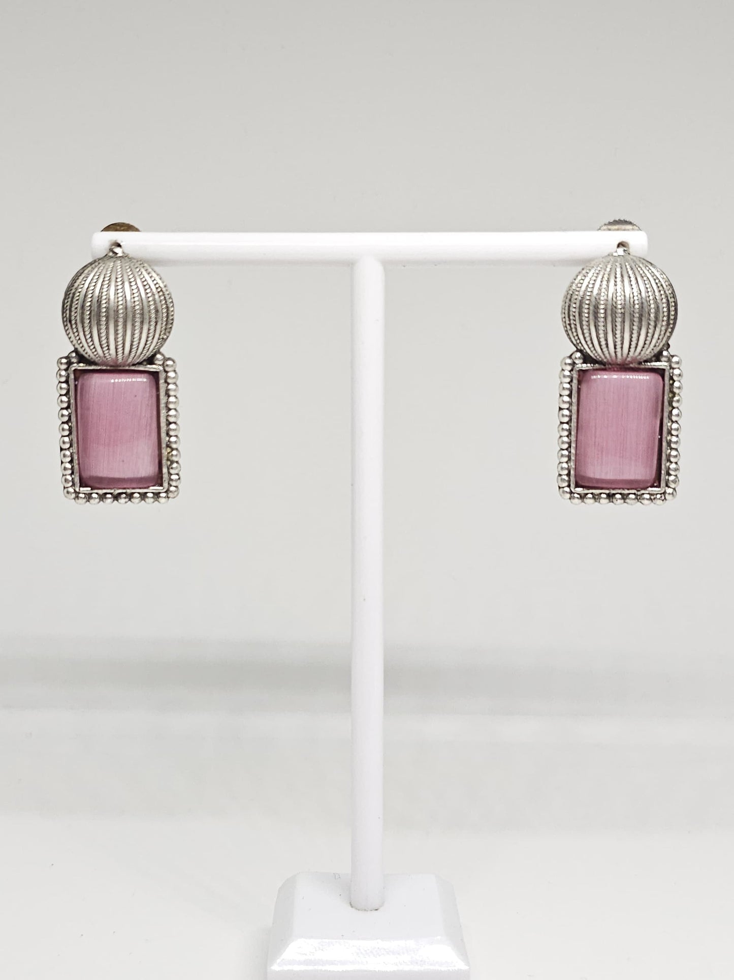 Silver dangling earrings with pink Monalisa stone and detailed beaded design