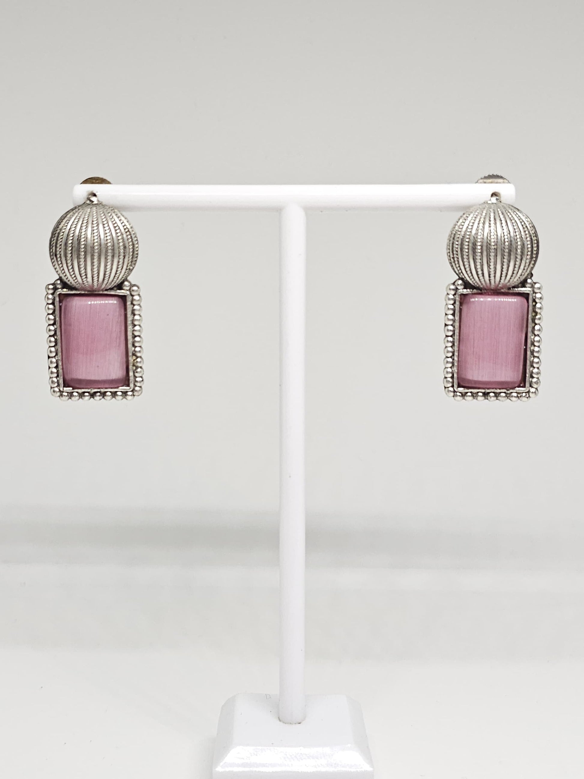 Silver dangling earrings with pink Monalisa stone and detailed beaded design