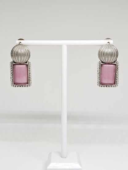 Silver dangling earrings with pink Monalisa stone and detailed beaded design