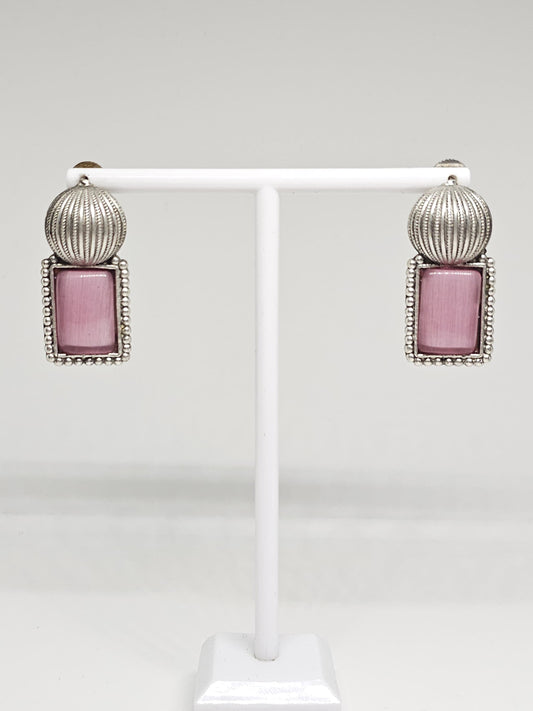 Silver dangling earrings with pink Monalisa stone and detailed beaded design