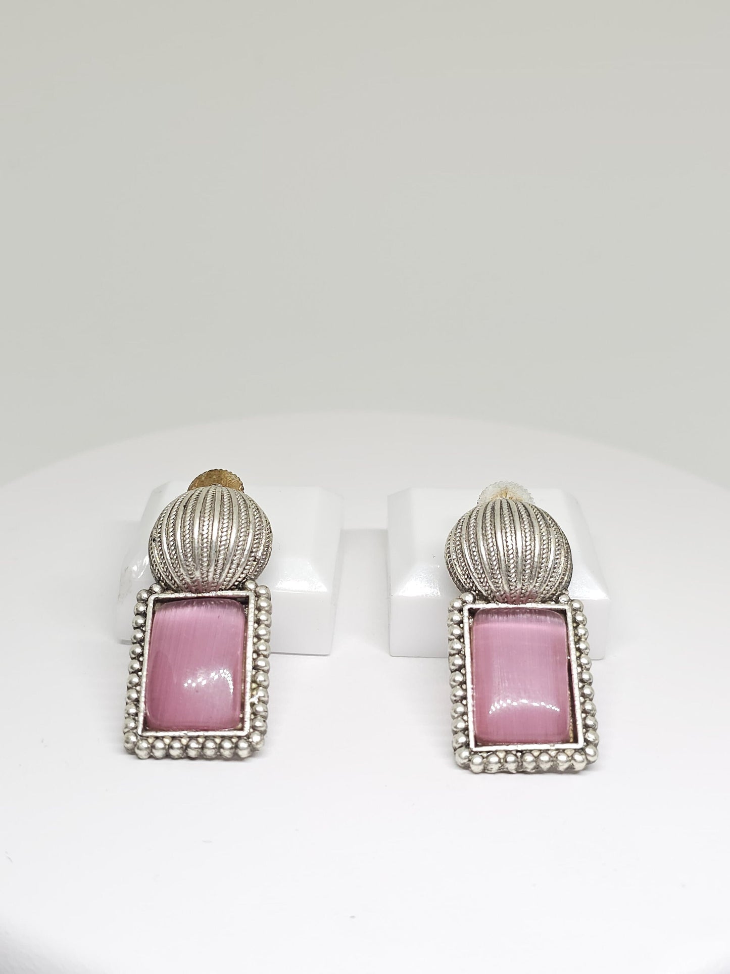 Handcrafted silver earrings featuring rectangular pink Monalisa stone and vintage-inspired detailing
