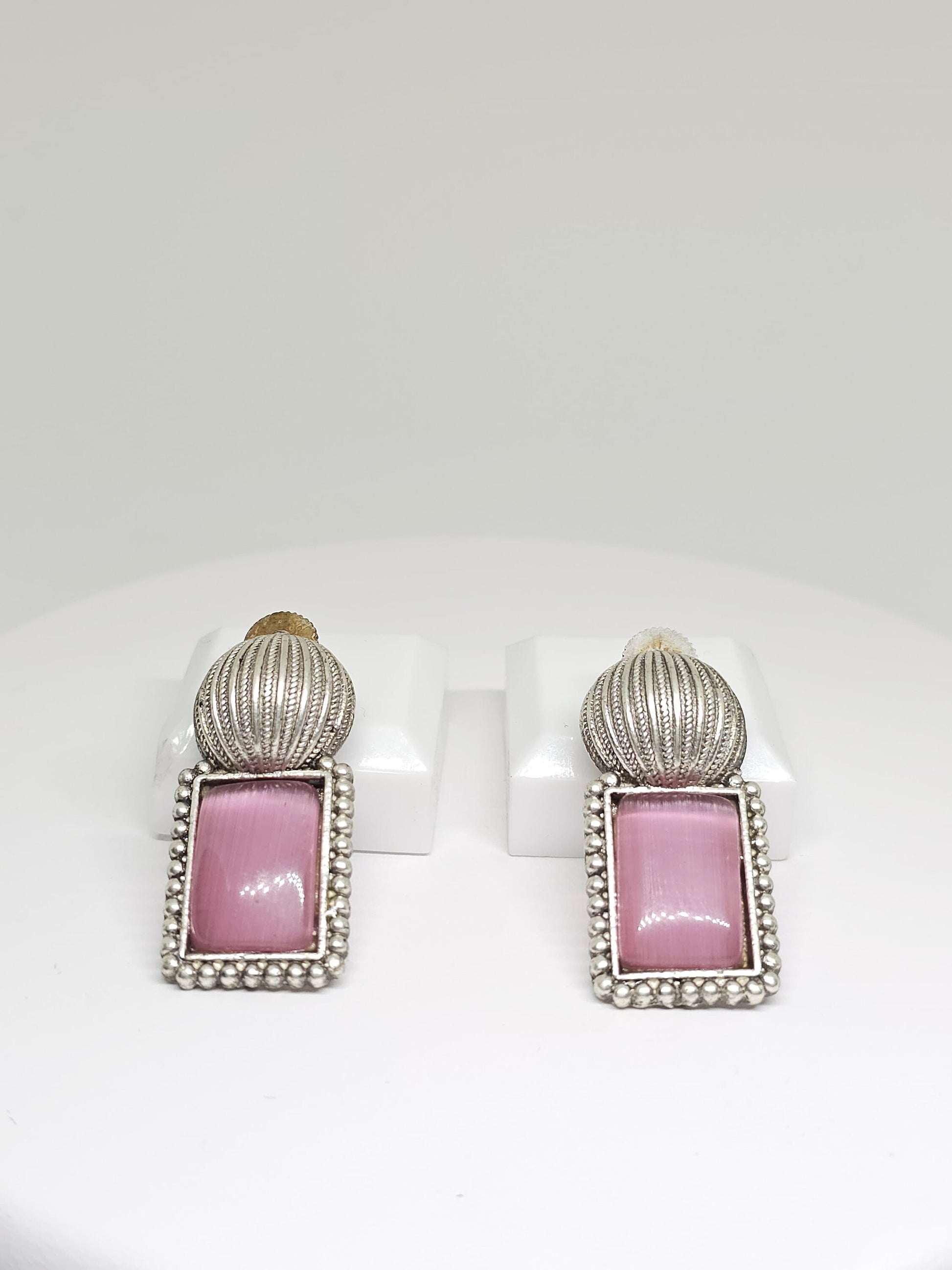 Handcrafted silver earrings featuring rectangular pink Monalisa stone and vintage-inspired detailing