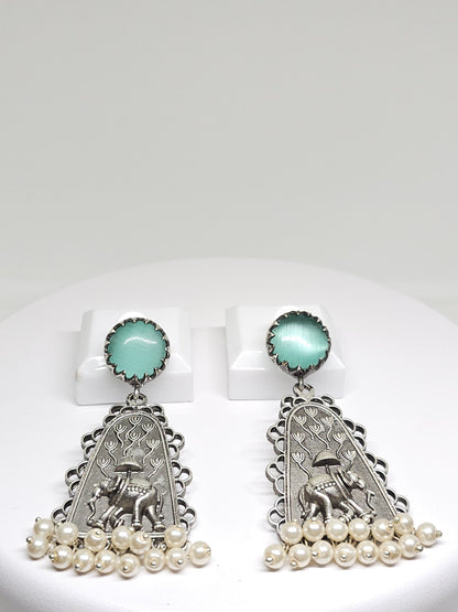 Silver earrings featuring mint green gemstones and elephant design, with pearl drops, unique bohemian jewelry