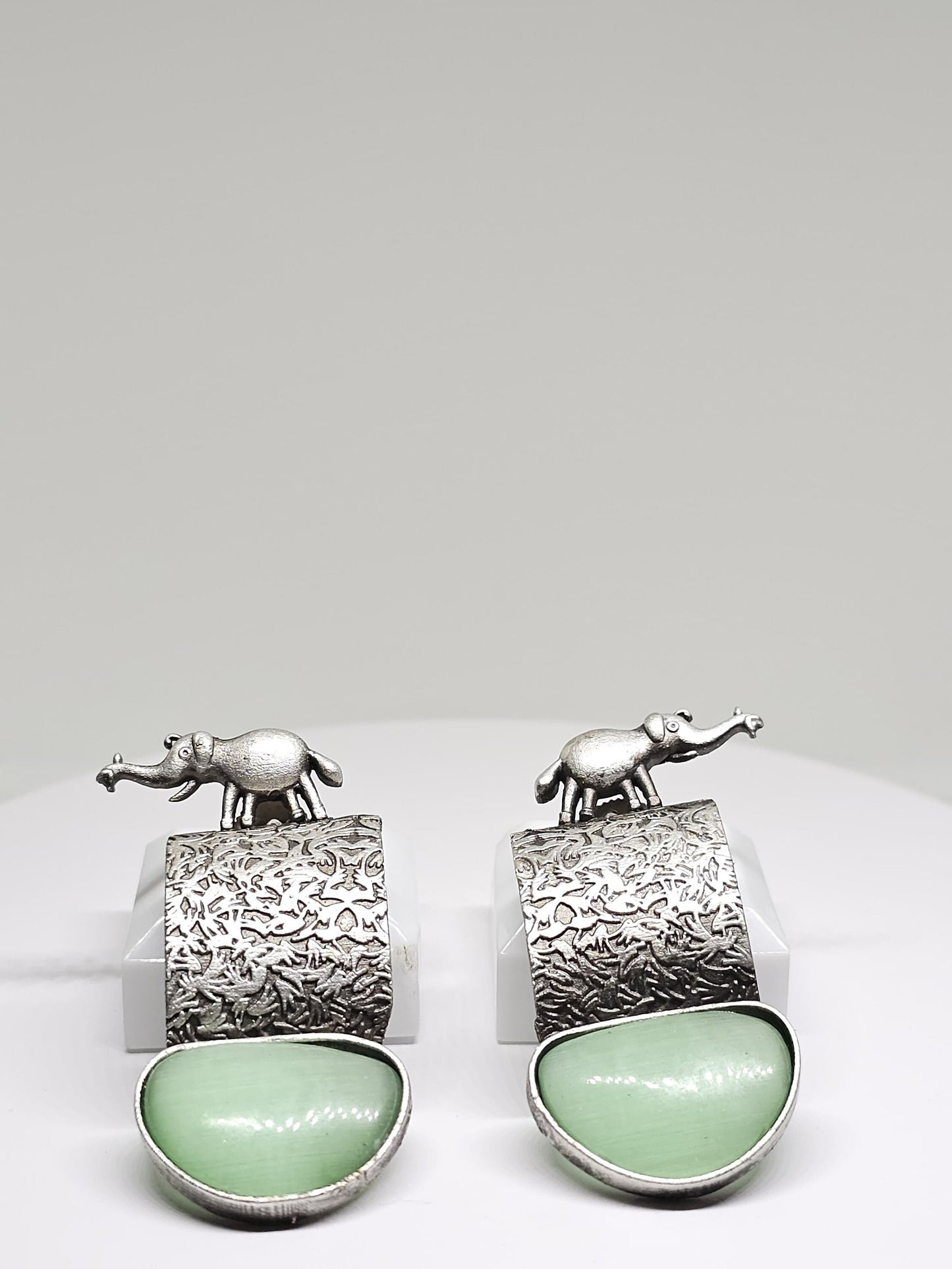 Handcrafted Silver-Plated Elephant Motif Earrings with Tribal Design, Featuring Green or Brown Stone Drops, Lightweight Dangle Jewelry