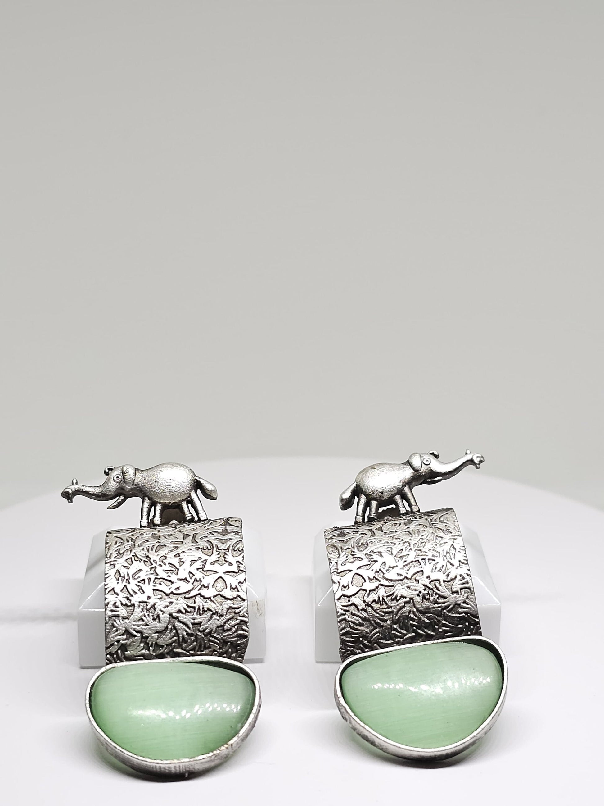 Handcrafted Silver-Plated Elephant Motif Earrings with Tribal Design, Featuring Green or Brown Stone Drops, Lightweight Dangle Jewelry
