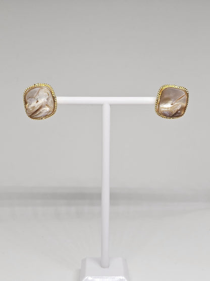 Handmade elegant earrings featuring iridescent pearl shell design