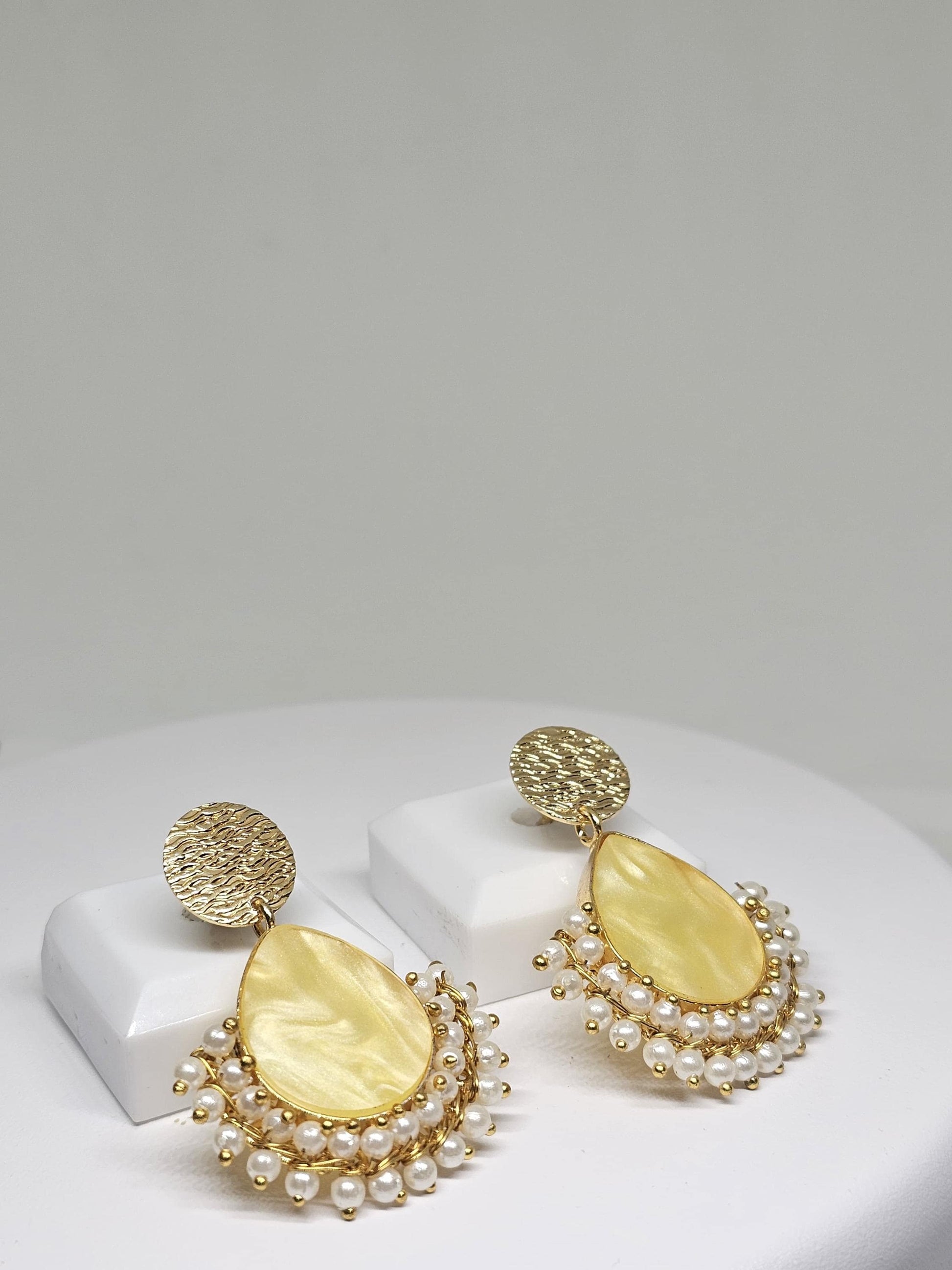 Gold Plated Brass Drop Earrings with Textured Design, Faux Pearl Beading, and Teardrop Centerpiece – Elegant Indian Pearl Jewelry for Women