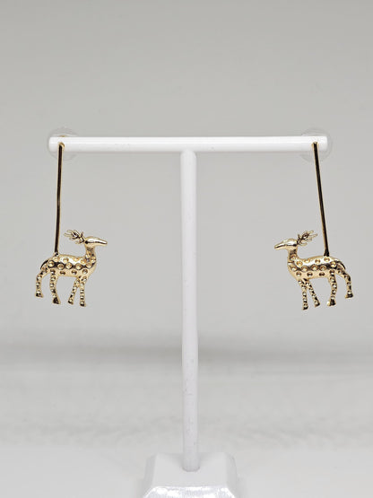 Golden reindeer dangle earrings with a minimalist bar design, crafted for festive occasions and Christmas celebrations. Perfect holiday gift for women
