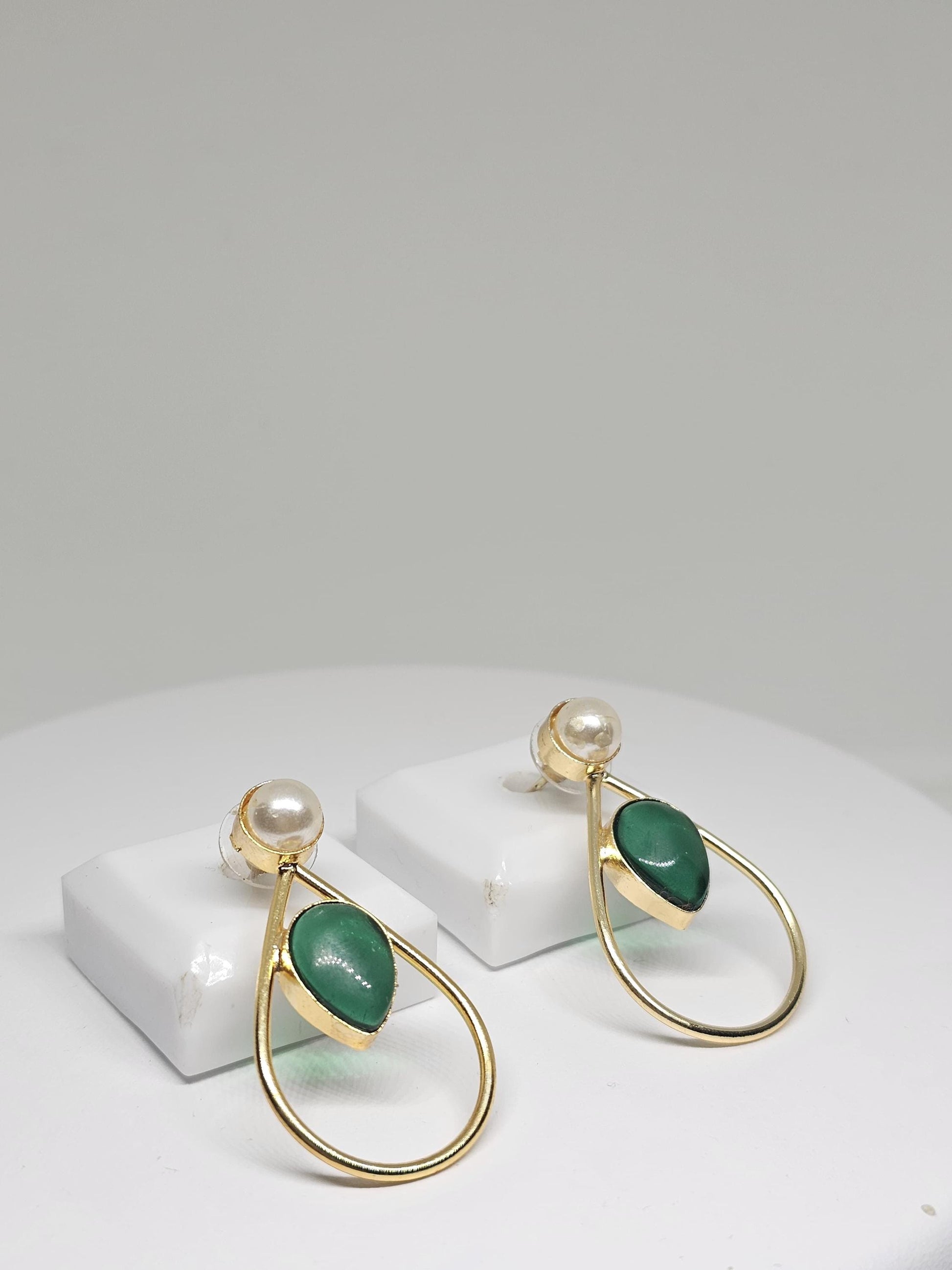 Gold teardrop earrings featuring mother-of-pearl stud and green stone drop, handcrafted for women