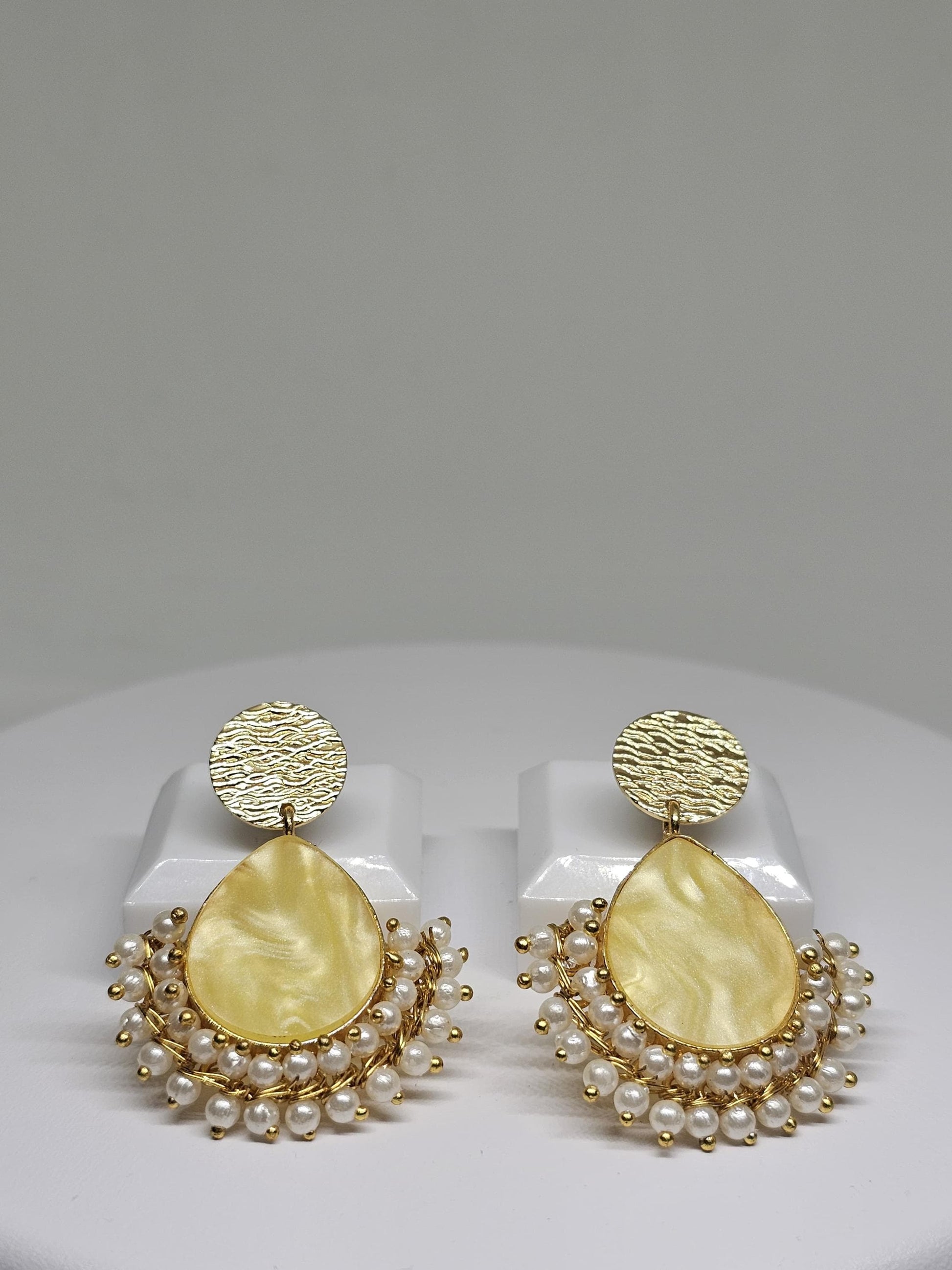 Gold Plated Brass Drop Earrings with Textured Design, Faux Pearl Beading, and Teardrop Centerpiece – Elegant Indian Pearl Jewelry for Women