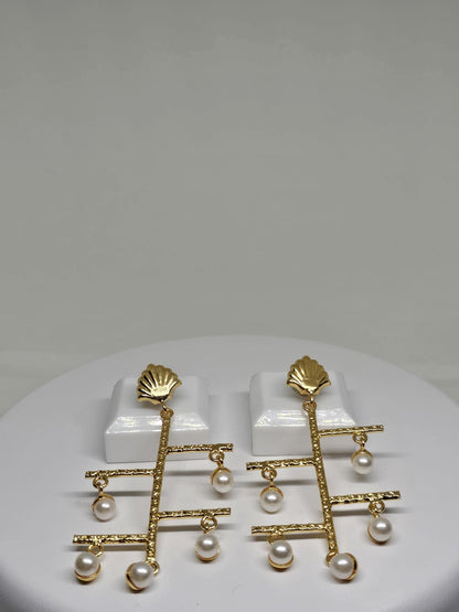Unique shell-stud earrings with cascading faux pearls and a lightweight geometric design for artistic flair