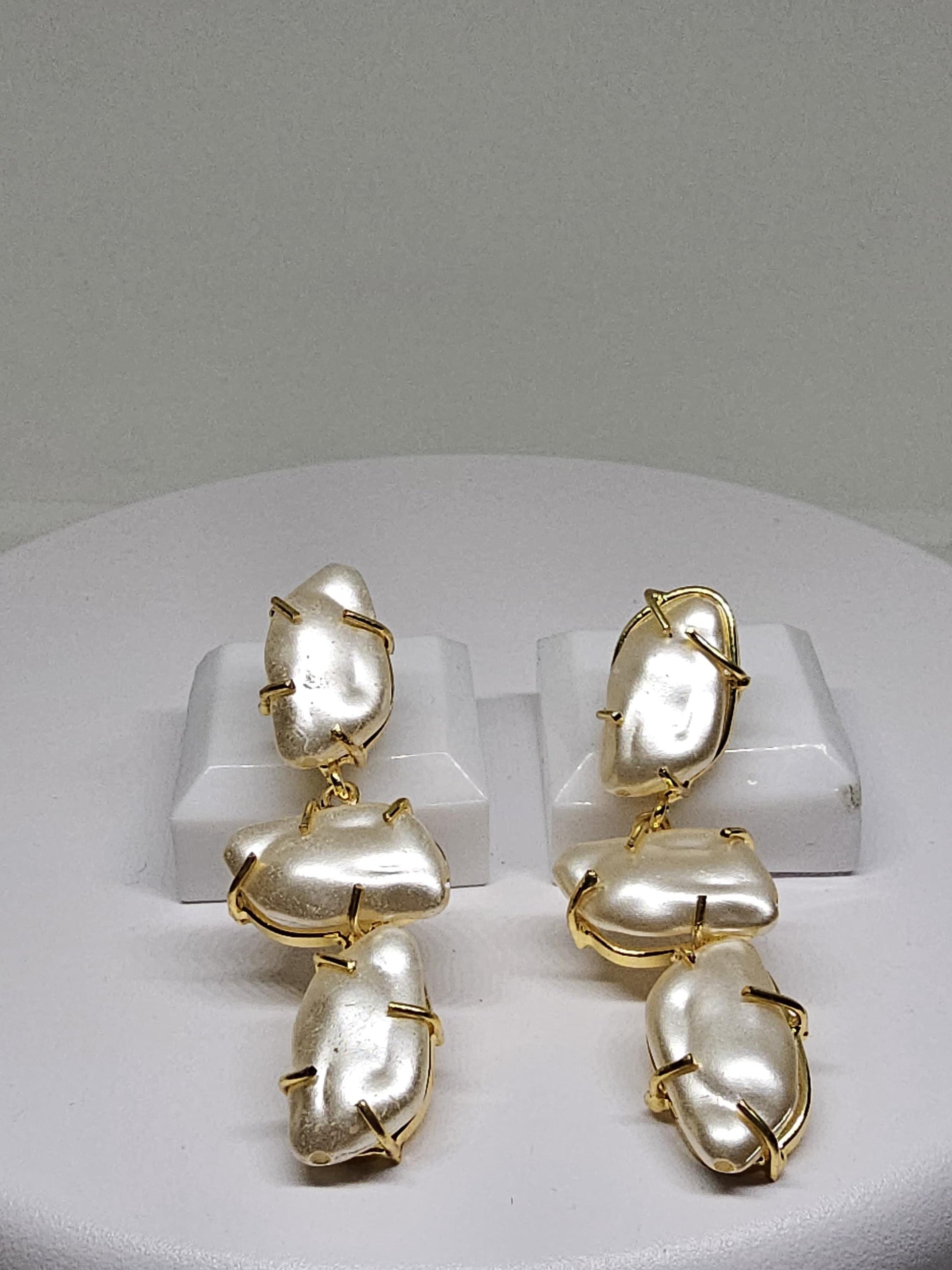 Gold-plated earrings with lustrous mother of pearl accents, lightweight and versatile, ideal for festive and party wear