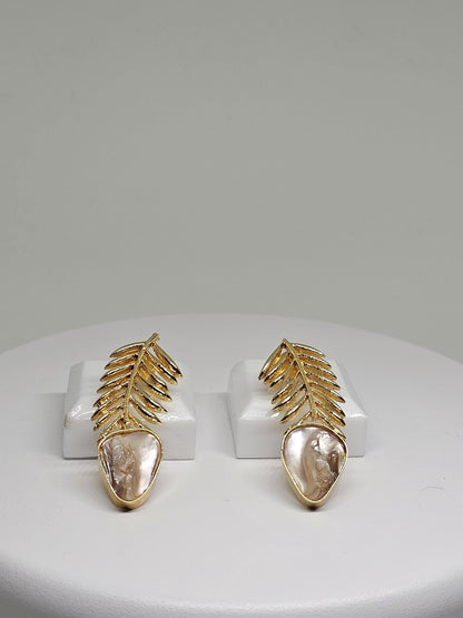 Elegant gold leaf earrings with a natural mother-of-pearl drop, featuring a lightweight and intricate design perfect for women seeking unique handmade jewelry