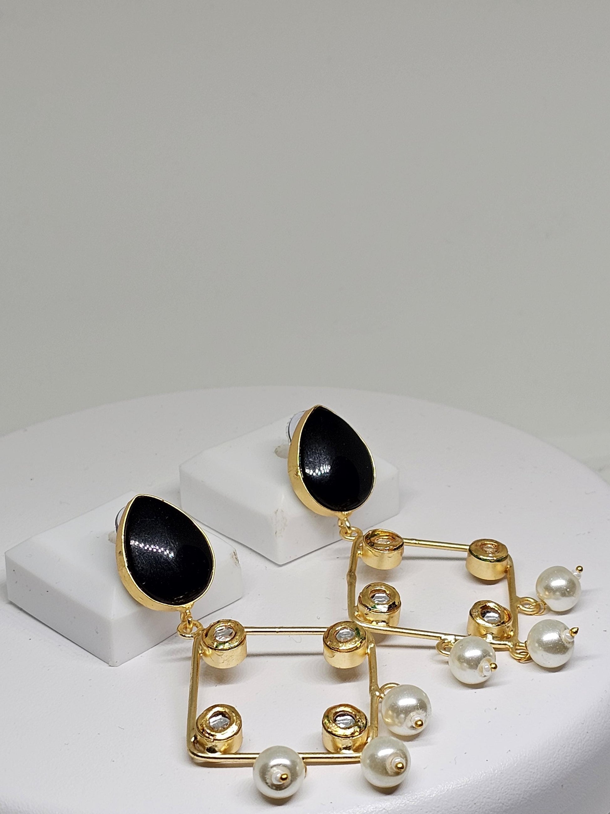 Geometric design with pearl dangles